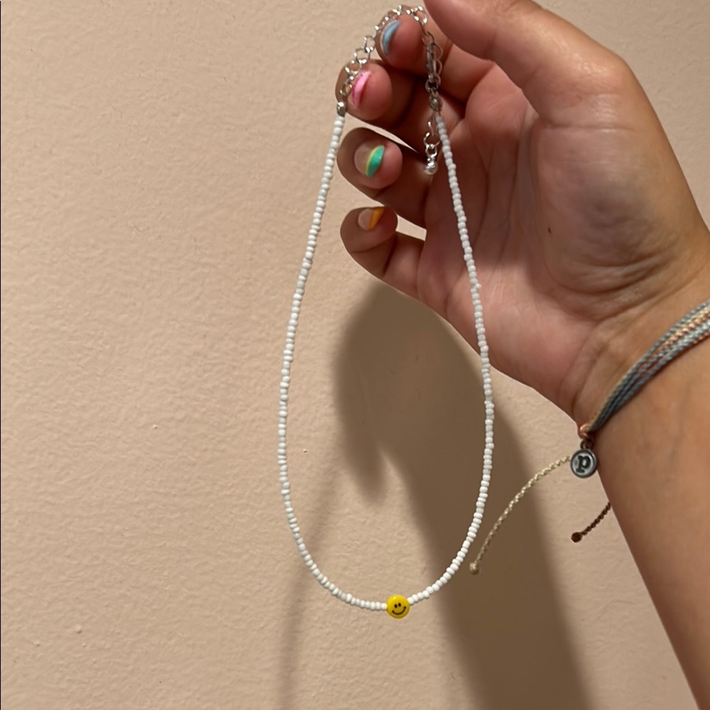White Beaded Necklace with Yellow Accent